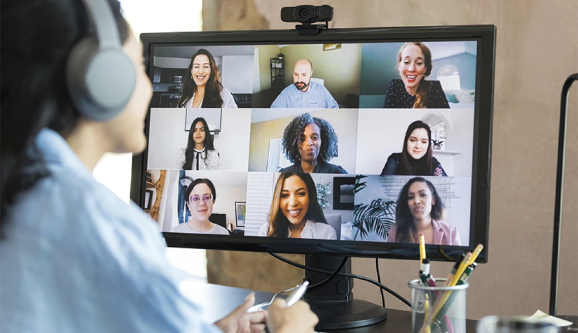 Person on zoom meeting on the computer
