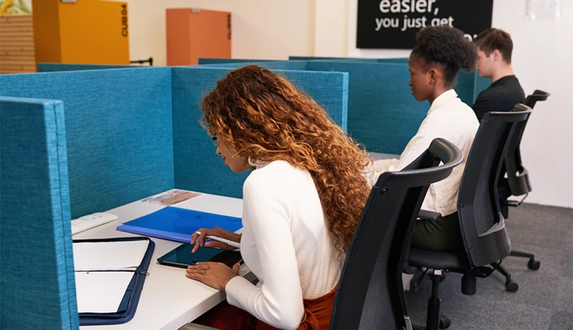 Students taking a test in a classroom setting